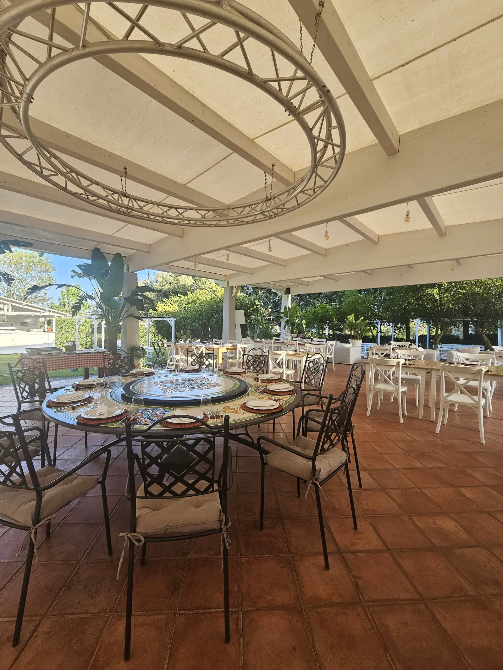 Tables set up in the Tenuta's gardens for a private event